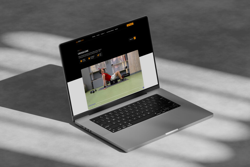 Online fitness platform website shown on a laptop