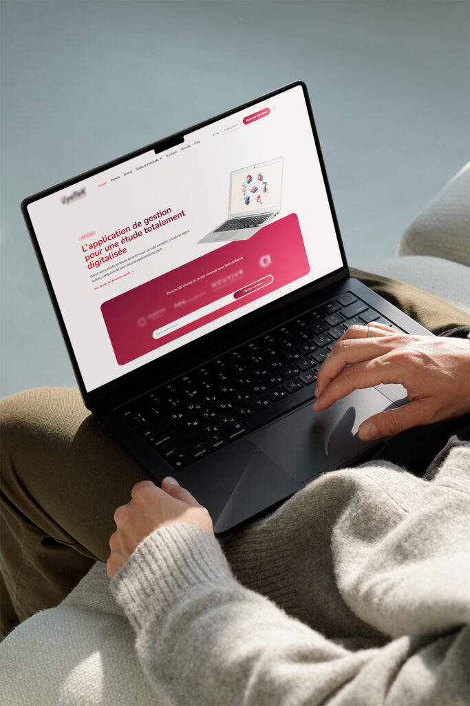 Web app landing page shown on a laptop